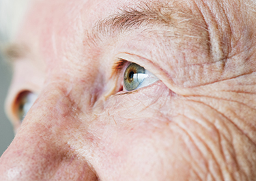 Closeup of an elderly fellow’s eyes.