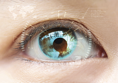 Closeup of an eye with a futuristic chart etched around the eye.