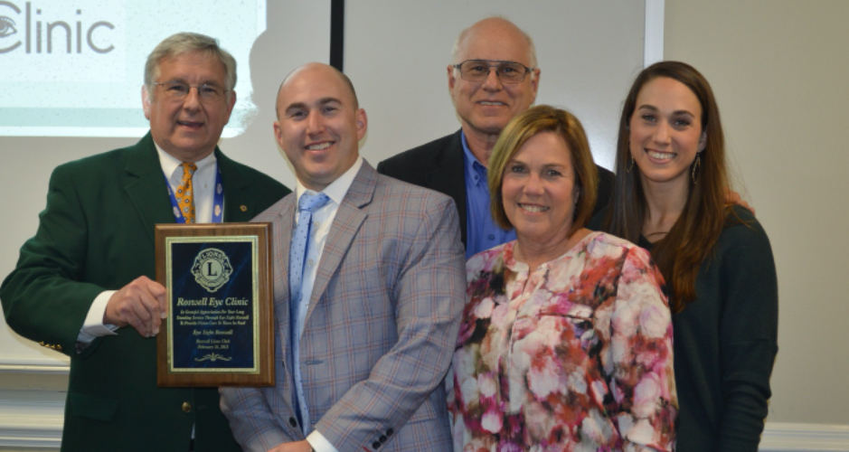 Roswell Eye Clinic physicians being presented an award from the Lions Club.