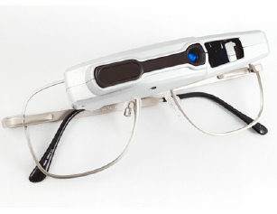 Eyeglasses with a visual field expander across the lenses